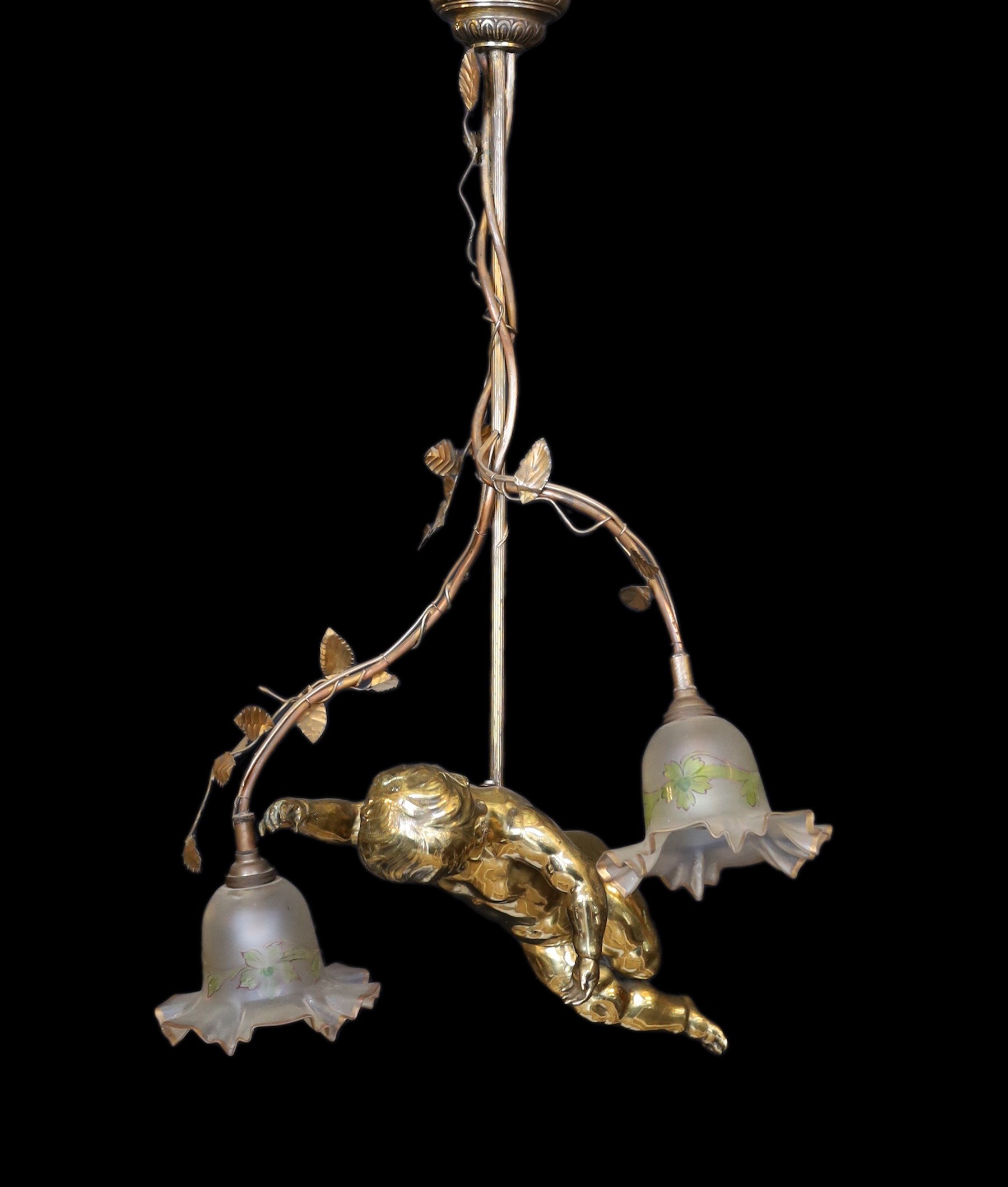 A 1920s French gilt bronze and wrought iron ceiling light with putto and rose motifs, drop 71cm. width 44cm